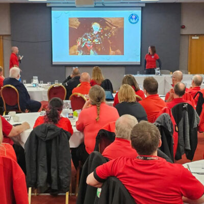 Delegates watching the Cave Rescue presentation